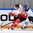 ST. PETERSBURG, RUSSIA - MAY 11: Hungary's Istvan Bartalis #28 stickhandles the puck away from Finland's Tommi Kivisto #4 during preliminary round action at the 2016 IIHF Ice Hockey World Championship. (Photo by Minas Panagiotakis/HHOF-IIHF Images)

